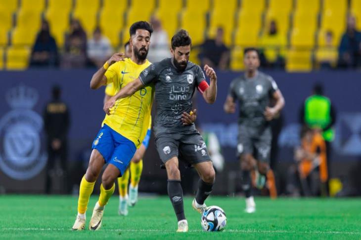محمد فوزير خلال مواجهة النصر والرائد